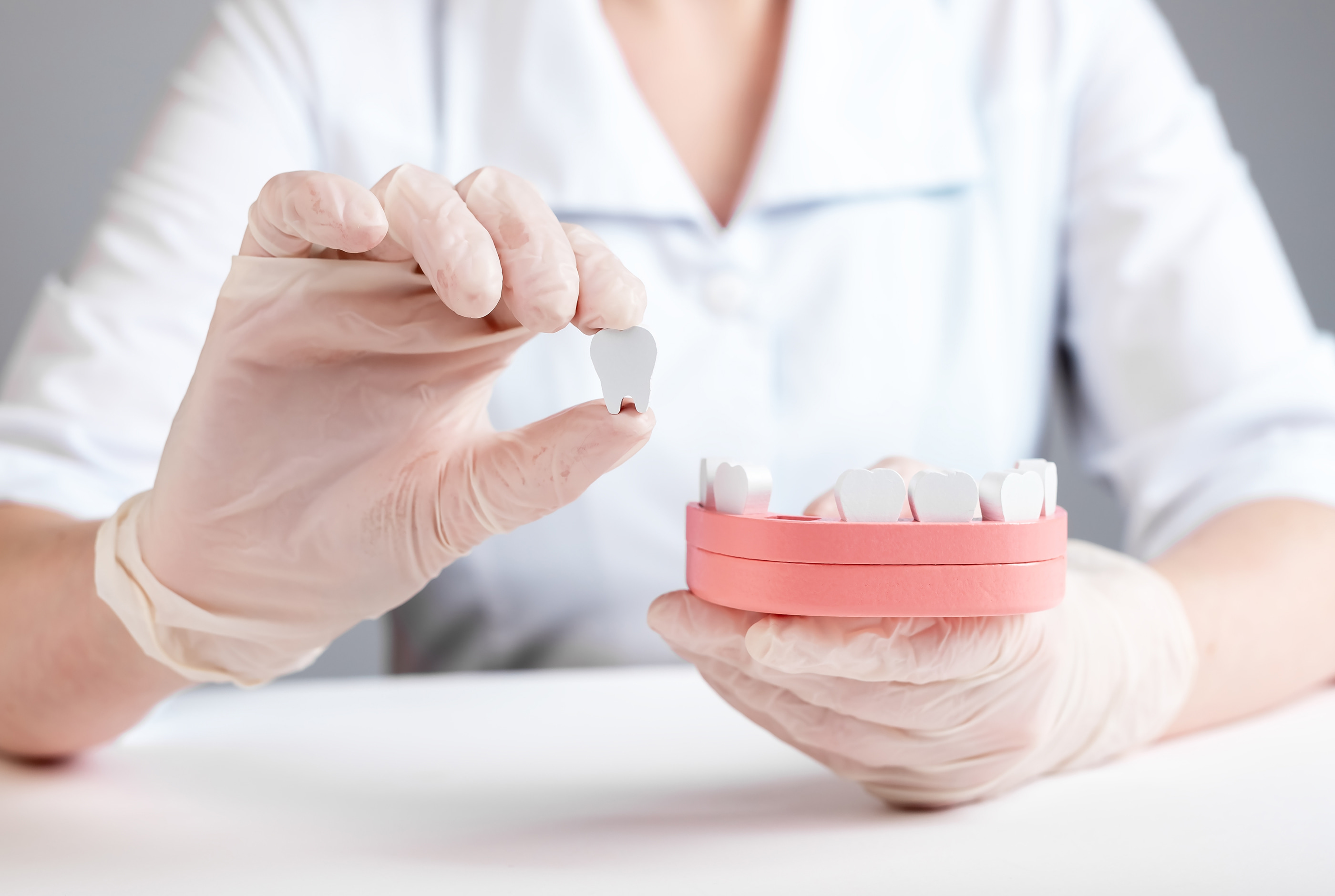 Replacing missing teeth benefits at Pure Arts